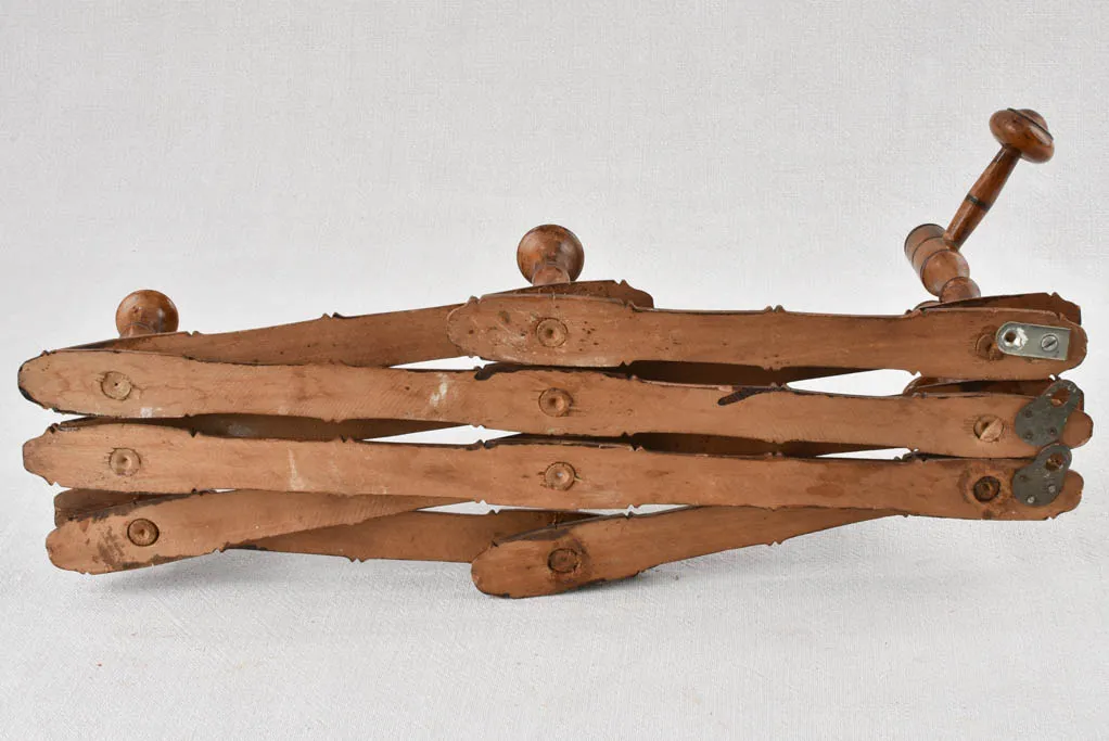 Antique concertina coat hooks 35½"