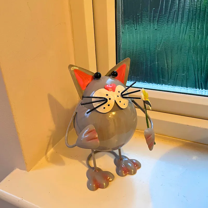 Short Grey Cat Holding Flower Metal Bobbin Cat Ornament